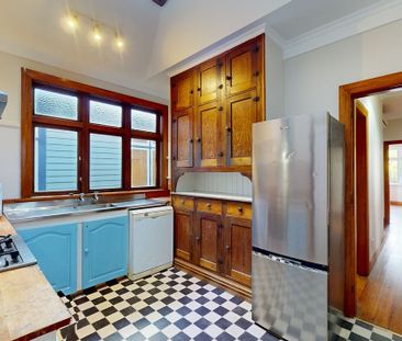 CENTRALLY LOCATED 4 BEDROOM HOME - Photo 1