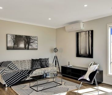 Family Home with Modern Features, 2 Bathrooms & Double Garage - Photo 3