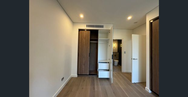 Convenience meets Luxury with this nearly-New Apartment- Level 11 - Photo 1