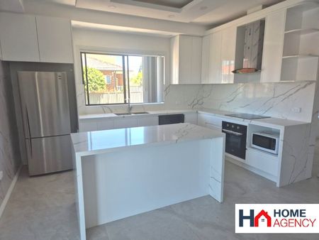 FULLY RENOVATED 4 BEDROOM HALF HOUSE (Top Level) - Photo 2