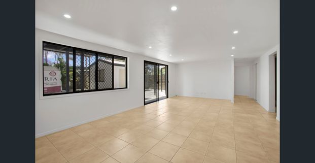 Spacious Dual-Level Family Home with Pool on Double Block – Minutes to the Beach - Photo 1