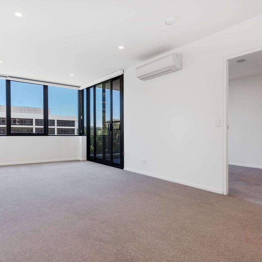 Neat and Modern Apartment in Highly Sought After Locale! - Photo 1