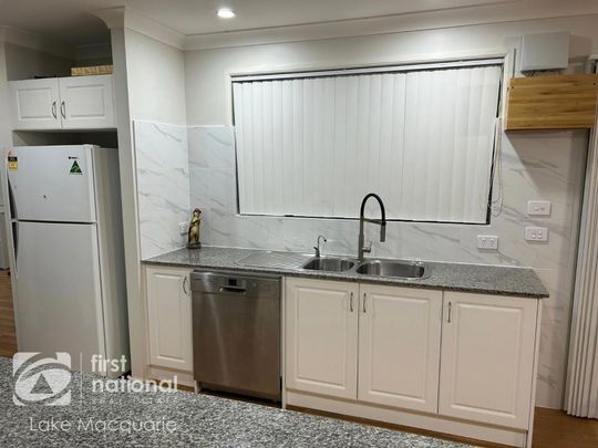 Charming and Spacious 4-Bedroom Home - Photo 1