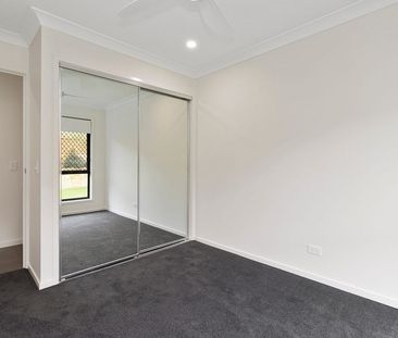 Stylish Family Living in Logan Reserve’s Growing Community - Photo 1