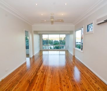 Conveniently Located Cottage with Captivating Water Views - Photo 6