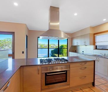 A UNIQUE HOME WITH STUNNING WIDE WATERS VIEWS - Photo 6