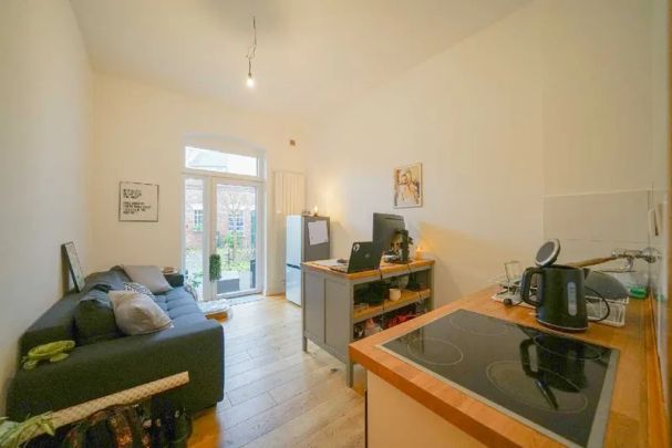 1-Zi.-Wohnung mit Wohnküche, Terrasse/Garten in Rtg-Mitte! - Photo 1