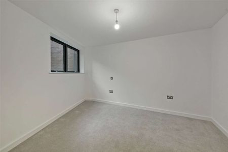 A brand new one bed apartment with one parking space offering light, modern interiors in a sought after location. - Photo 4