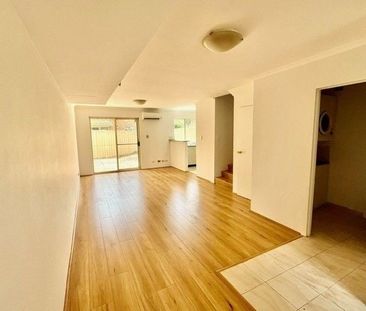 Secure Full Brick Townhouse in Prime Location, Walk to Stations, Sc... - Photo 1