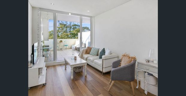 Sun-Drenched Dual-Level Living with Resort-Style Facilities - Photo 1
