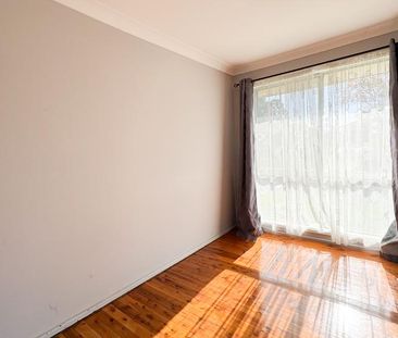 Peaceful Suburban Living in a Central, Well-Connected Location - Photo 4