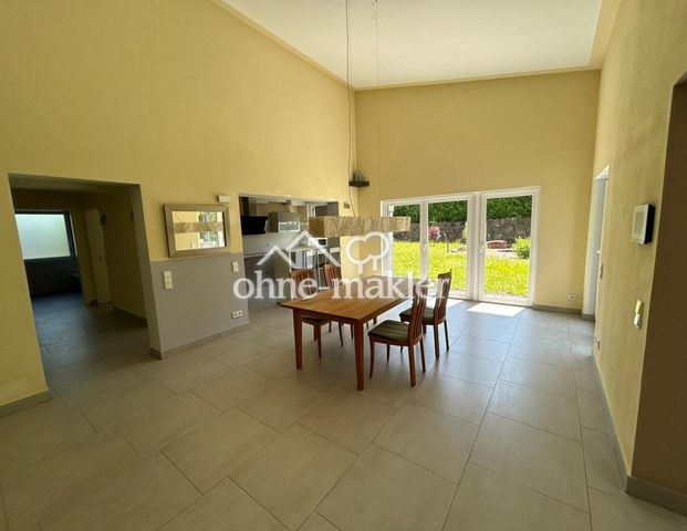 Wunderschöne moderne Erdgeschoß-Wohnung mit überdachter Terrase und eigenem Garten - Foto 1