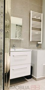 CENTRE VILLE - 2P NEUF AVEC JARDIN - Photo 3