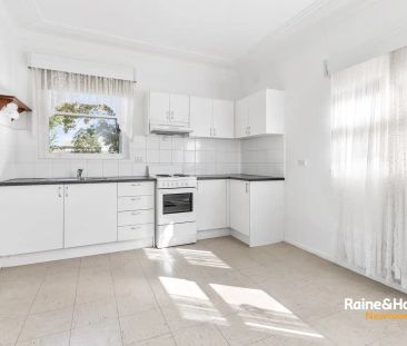 “Tidy solid home with a lush backyard” - Photo 3