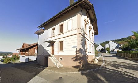 Charmante 4.5-Zimmer-Wohnung in denkmalgeschütztem Gebäude in Büsserach - Photo 2