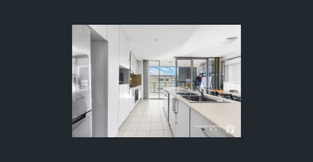 Two Bedroom Apartment in Architect Designed Complex - Photo 4