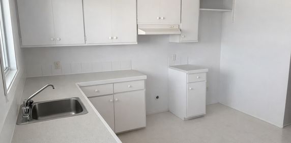 GRAND 4 ½|CHAUFFAGE-EAU CHAUDE - Photo 2