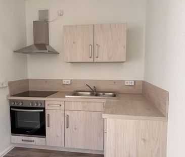 Erstbezug nach Sanierung - EBK, Balkon und Hausgarten - Photo 1