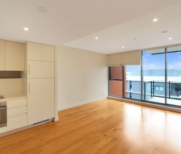 North Facing Bedroom with New Appliances and Floorboards! - Photo 2