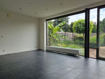 Knap gelijkvloers éénslaapkamerappartement met tuin en garagebox. - Photo 3