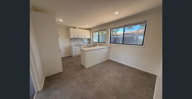Freshly Renovated Family Home in the Heart of Ambarvale! - Photo 1