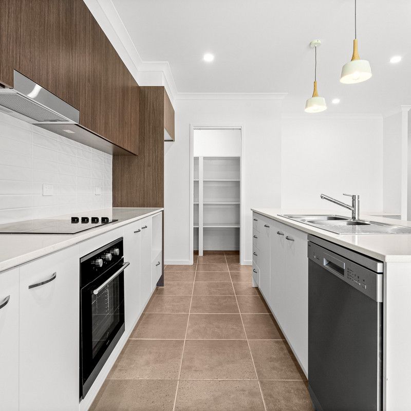 Brand New Four Bedroom Home - High Ceilings & Ducted A/C - Photo 1