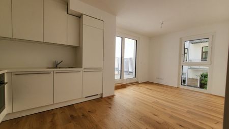 Smarte 2-Zimmer-Wohnung mit Hofterrasse: Hochwertige Ausstattung + Ausgezeichnetes Raumkonzept - Photo 4