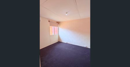 Two-storey, two-bedroom unit - Photo 3