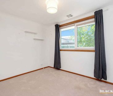 A Renovated 4-Bedroom Gem with Endless Potential - Photo 1