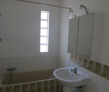 Location Appartement 3 pièces 74m² - Photo 3