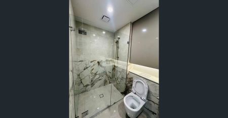 PREMIUM HIGH-RISE APARTMENTS SET WITHIN THE BESPOKE COMMUNITY OF MACQUARIE PARK - Photo 5