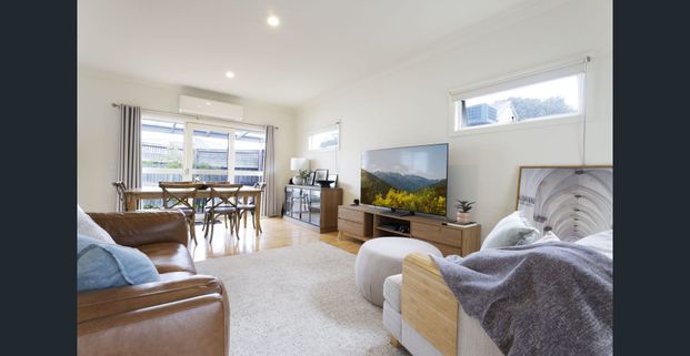 AS NEW TOWNHOUSE IN IDEAL LOCATION - Photo 1