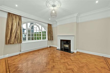 Set in a prime location, this substantial Edwardian home offers space, character, modern convenience, a mature garden, and tandem garage. - Photo 2