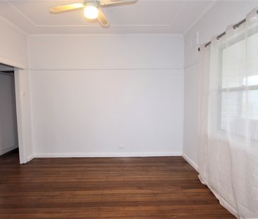 2 Bedroom Home with Sunroom, In A Great Position - Photo 6