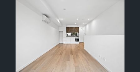 Modern, split level spacious two bedroom apartment! - Photo 2