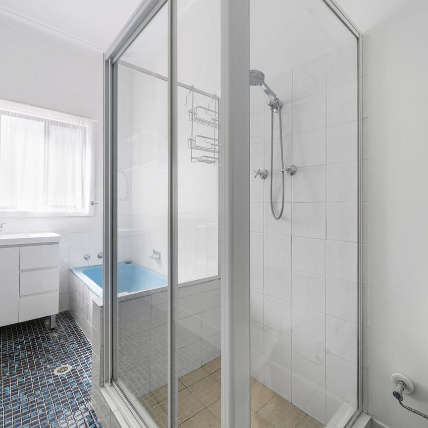 Spacious & Charming 3-Bedroom Home - Photo 1