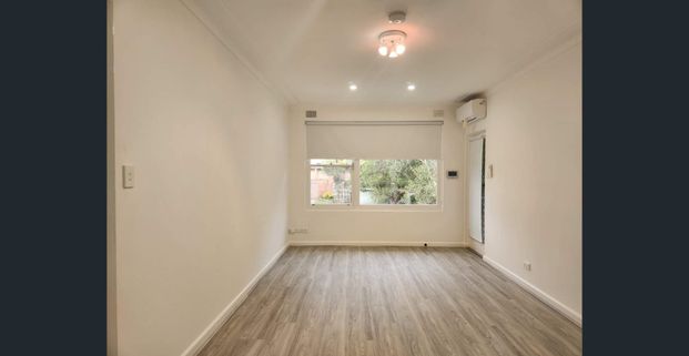 FULLY RENOVATED TWO-BEDROOM UNIT - Photo 1