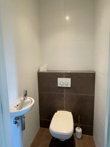 Welgelegen appartement met twee slaapkamers en autostaanplaats - Photo 5