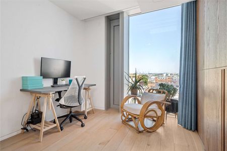 A top floor two bedroom apartment with stunning views in the Barts Square development. - Photo 3