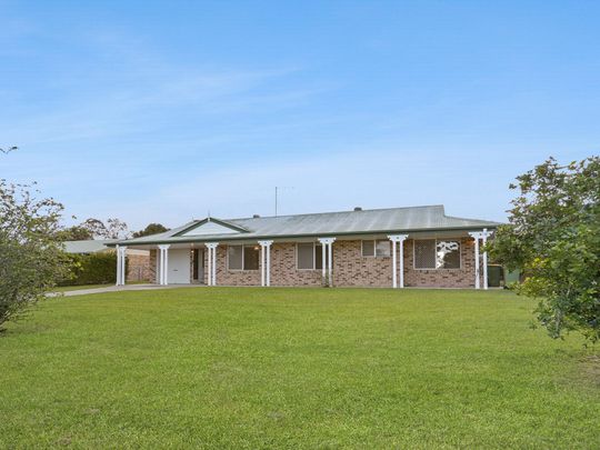 Spacious 3 Bedroom Home with Large Backyard - Photo 1