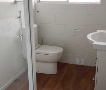 Nicely presented, upstairs, two bedroom unit. - Photo 5