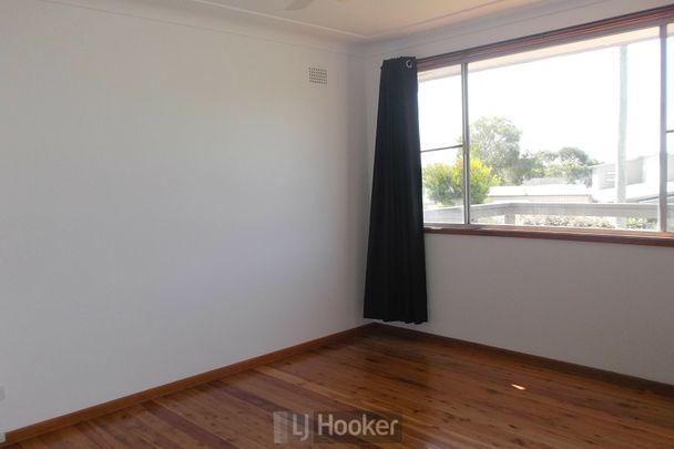 THREE BEDROOM FAMILY HOME - Photo 1