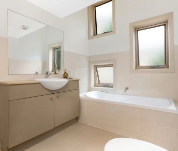 Sunbathed Beachside Abode Spread Over Three Levels - Photo 4