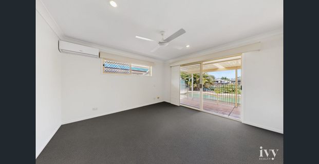 Freshly Refreshed Waterfront Family Home in a Convenient Helensvale Location - Photo 1