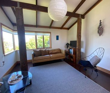 Charming 2BR Home with Lush Garden - Photo 1