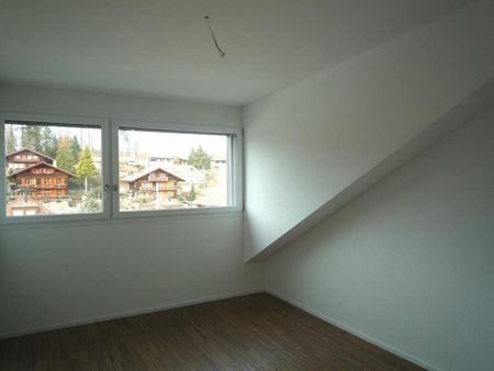 Ultra-modern 3.5-room penthouse apartment in Niederscherli - Photo 2