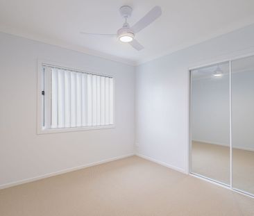 Stylish New 4-Bedroom Home in Royal Pines Estate - Photo 4