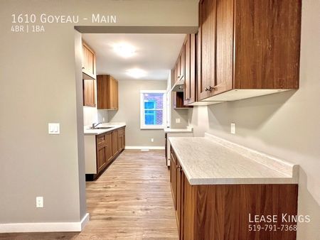 Completely Renovated 4 Bedroom 1 Bathroom Main Floor Unit - Photo 5