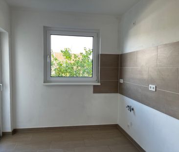 Top modernisiert: Wohnen in begehrter Erdgeschosslage mit 2 Balkonen - Foto 5