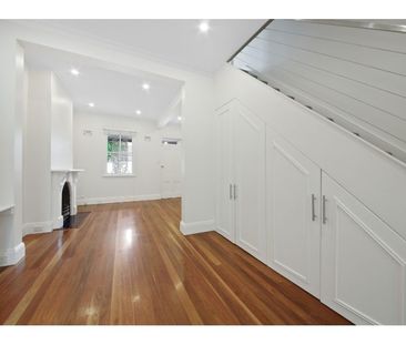 Spacious Two Storey One Bedroom Terrace with Sunny Private Courtyard - Photo 1